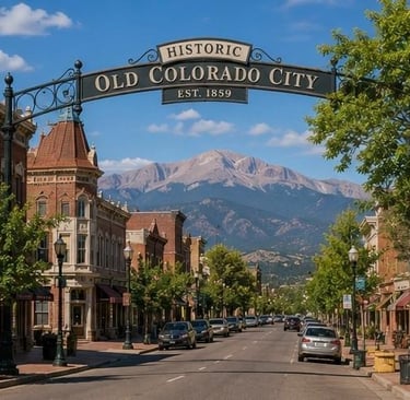 historic brick buildings and Victorian era residential properties along Colorado Avenue in Old Colorado City Colorado