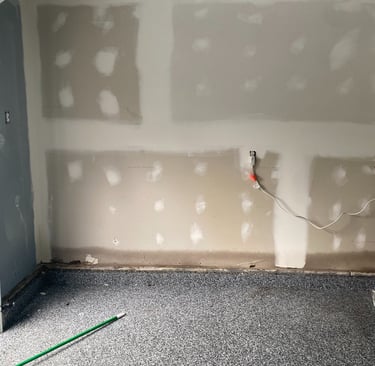 drywall taping wall before painting