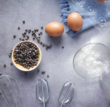 a table with eggs, eggs, and chocolate chips