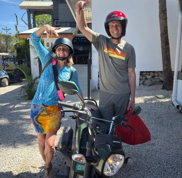 Couple on a motorcycle adventure exploring off-the-beaten-path beaches near Potrero