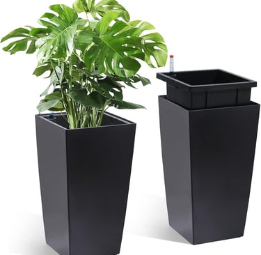Tall black self-watering planter with a lush Monstera Deliciosa houseplant and water level indicator.
