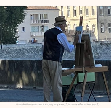 Artist painting what he sees in Arles, France