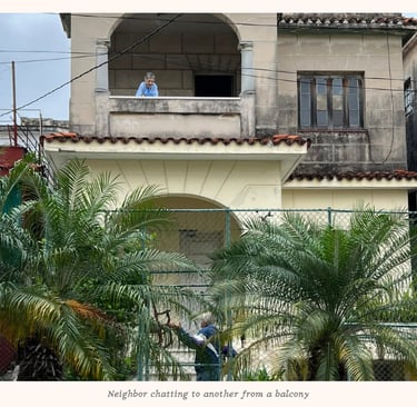 Neighbors talking from a balcony in Havana Cuba 