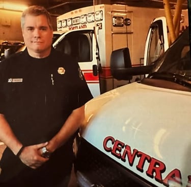 2014 picture of Tim Nangle in uniform, at fire station