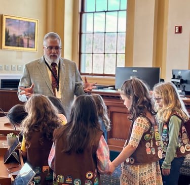 Tim at the Maine State House with visiting Girl Scout Brownies
