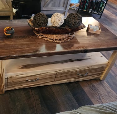 walnut and ambrosia maple coffee table with sliding dovetails. full extension, soft close drawers.
