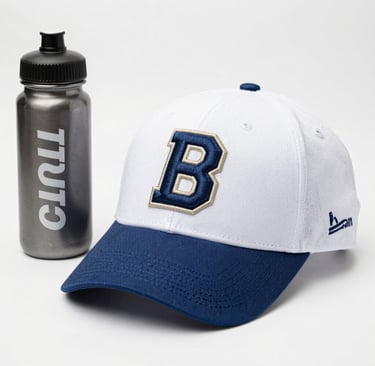 A display of custom hats lined up on a table at a bustling tournament event.