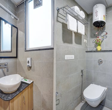 Fresh bedsheets and clean rooms at RJK Stay