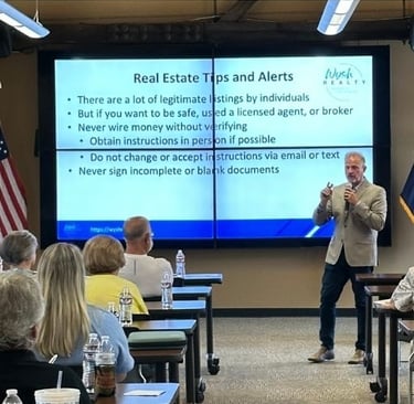 Brian is talking at a real estate tips event