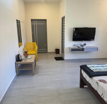 Family Bedroom with dining area, smart tv and King size bed