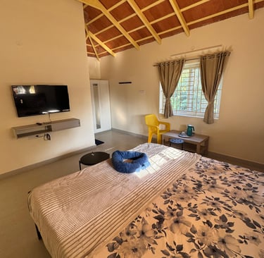 Family Bedroom with wide window, cupboard and Smart TV