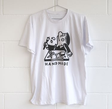 Custom screen printed tote bag featuring a black line art illustration of embracing figures.