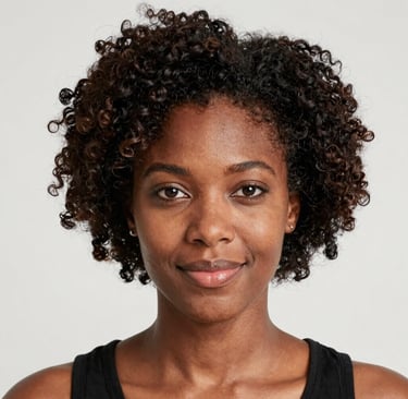 Close-up of a relaxed woman gently touching her waist, with a warm beige background.