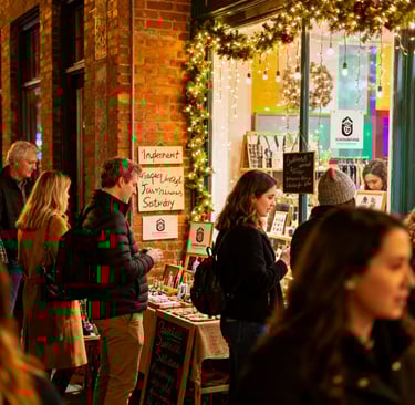 a group of people standing in front of a store