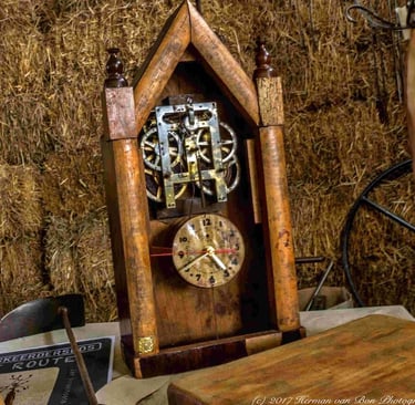 Reclaimed material clock with exposed gears in wood by Jan Vingerhoets