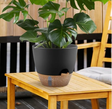 Black self-watering plant pots with built-in water level indicator and saucers for large plants