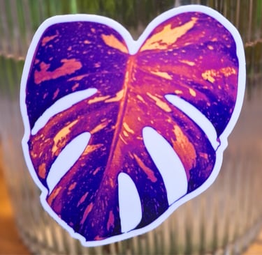 close up of neon vaporwave monstera leaf magnet showing tropical plant design