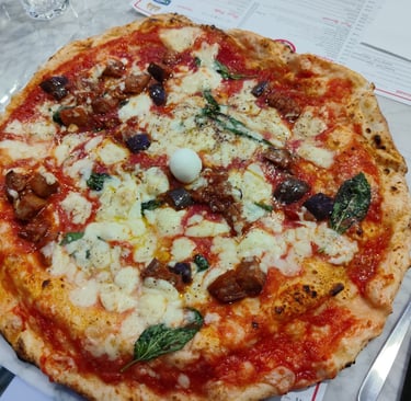 La celebre pizza a Ruota di Carro proposta da Gennaro Rapido.