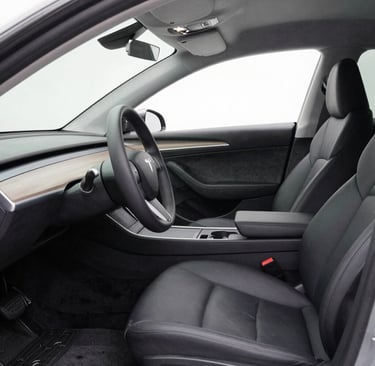 Interior dashboard and seats after intensive cleaning, looking fresh and rejuvenated.