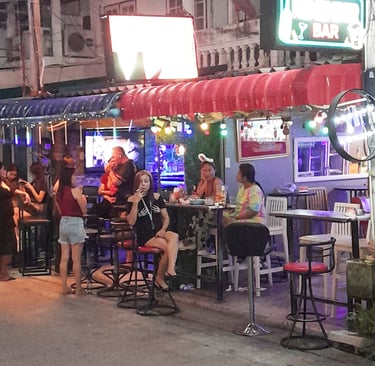 Thai women outside bars at Soi 80, Hua Hin in Thailand