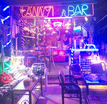 Outside view of Anny Bar under neon lights on Soi 94, Hua Hin