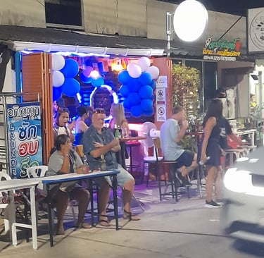 Customers sat at bar party on Soi 94 in Hua Hin