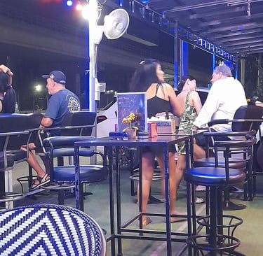 Thai women and customers at bar near Soi 94 in Hua Hin