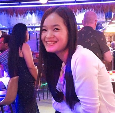 Thai woman smiling in bar at Wonderland 2 in Hua Hin