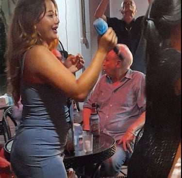 Thai woman singing at bar party on Soi 94 in Hua Hin