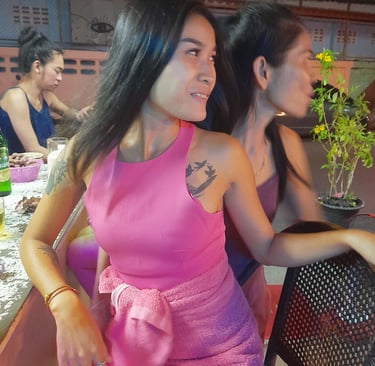 Thai women in Nees Tiki Club, sat at the bar, in Hua Hin
