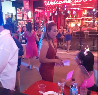 Thai women at party at bar, on Soi 80 in Hua Hin