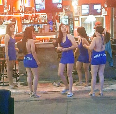 Thai women oustside bar on Soi 80 in Hua Hin