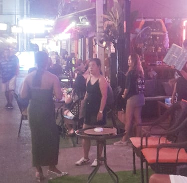Thai women outside bar on Soi Bintabaht, Hua Hin in Thailand