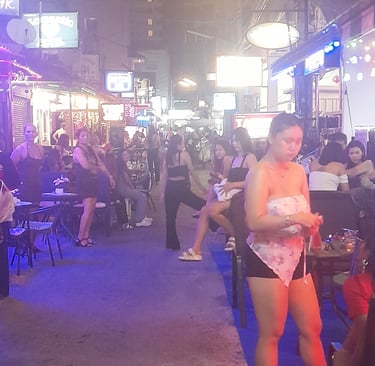 Thai women outside bars on Soi Bintabaht, Hua Hin in Thailand