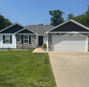 1600 s.f. ranch style house in London, KY. 3 bedroom, 400s.f. garage with vinyl siding,shingle roof.