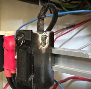 buzzy Noise from switchboard donot ignore call sparky g otherwise fuse could melt as shown in photo