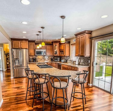 Modern kitchen renovation with pendant and recessed LED lights Victoria BC home