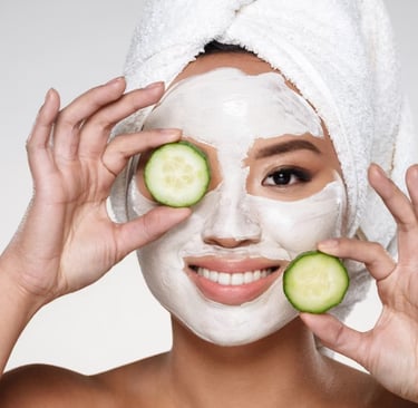 Refreshing facial treatment with cucumber slices and glowing skincare mask