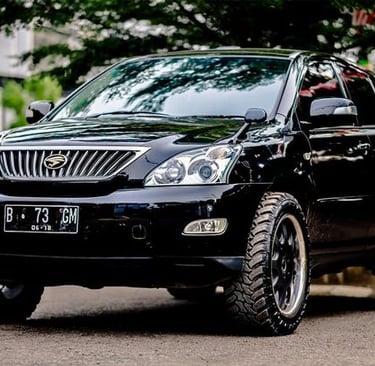 Lexus RX 330 parked at Tyrepublic’s Lagos tyre shop with Bridgestone tyres installed