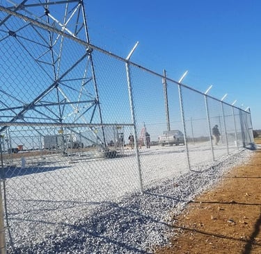 Commercial chain link fence with barbed wire installed for business security in Kentucky