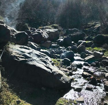 A creek with large rocks