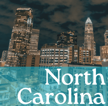 Charlotte skyline at night with the words "North Carolina" written in white 