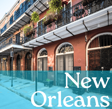 A building in the French Quarter with the words "New Orleans" written in white