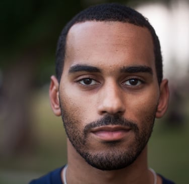 Portrait of Justin LaSuere Mabrie, Qatar — Faces of Qatar project. Photo: Mohammed Zarrugh Ismail