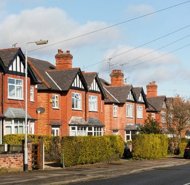 houses in Ironbridge with a car parked on the side of the road