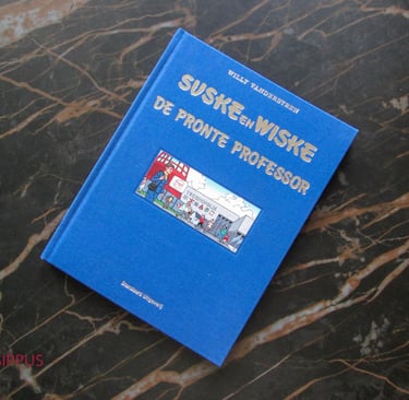 a comic with a blue book cover and a picture of a building