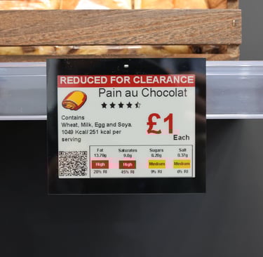 a electronic digital label sign that says pain au chocolat and a price tag on it