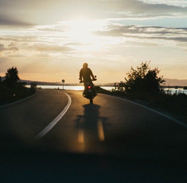 Photo by Djordje Petrovic: https://www.pexels.com/photo/person-riding-motorcycle-during-golden-hour-