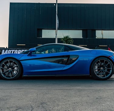 Photo by Joaquin  Delgado : https://www.pexels.com/photo/sapphire-blue-mclaren-600lt-sports-car-park