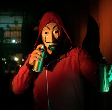 Photo by Johann Pictures: https://www.pexels.com/photo/a-person-holding-spray-paint-cans-9129725/